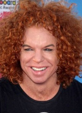 This image has an empty alt attribute; its file name is Carrot-top.jpg